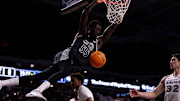 Cincinnati Bearcats forward Aziz Bandaogo (55) dunks in the first half of the NCAA Basketball game between the Cincinnati Bearcats and the Xavier Musketeers at Fifth Third Arena in Cincinnati on Saturday, Dec. 14, 2024.