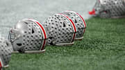 Jan 18, 2025; Atlanta, GA, USA; A Ohio State Buckeyes helmets on the field during practice at Mercedes-Benz Stadium. Mandatory Credit: Kirby Lee-Imagn Images