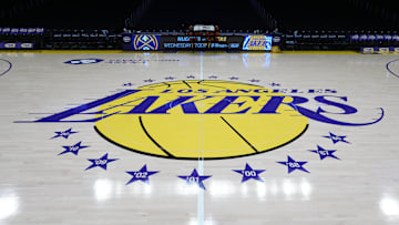 Mar 17, 2025; Los Angeles, California, USA; The Los Angeles Lakers logo at midcourt at Crypto.com Arena. Mandatory Credit: Kirby Lee-Imagn Images