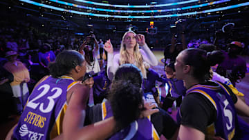 Jul 16, 2024; Los Angeles, California, USA; LA Sparks players huddle around forward Cameron Brink during the game against the Seattle Storm at Crypto.com Arena. Mandatory Credit: Kirby Lee-Imagn Images