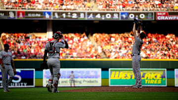 Boston Red Sox pitcher Kutter Crawford (50) gets a visit at the mound in the second inning of the MLB baseball game between the Cincinnati Reds and the Boston Red Sox at Great American Ball Park in Cincinnati on June 21, 2024.