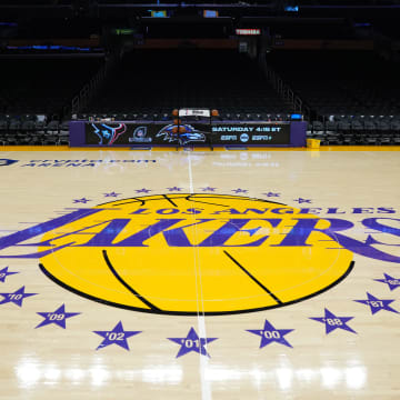 Jan 17, 2024; Los Angeles, California, USA; The Los Angeles Lakers logo at center court at the Crypto.com Arena. Mandatory Credit: Kirby Lee-USA TODAY Sports