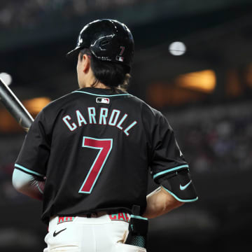 Sep 2, 2024; Phoenix, Arizona, USA; Arizona Diamondbacks outfielder Corbin Carroll (7) waits on deck against the Los Angeles Dodgers during the seventh inning at Chase Field. Mandatory Credit: Joe Camporeale-USA TODAY Sports