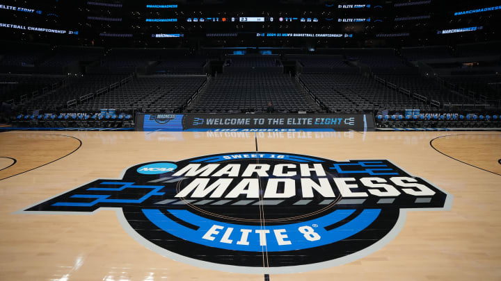 Mar 30, 2024; Los Angeles, CA, USA; The NCAA March Madness Sweet 16 and Elite Eight logo at midcourt before the game between the Clemson Tigers and the Alabama Crimson Tide in the finals of the West Regional of the 2024 NCAA Tournament at Crypto.com Arena. Mandatory Credit: Kirby Lee-USA TODAY Sports