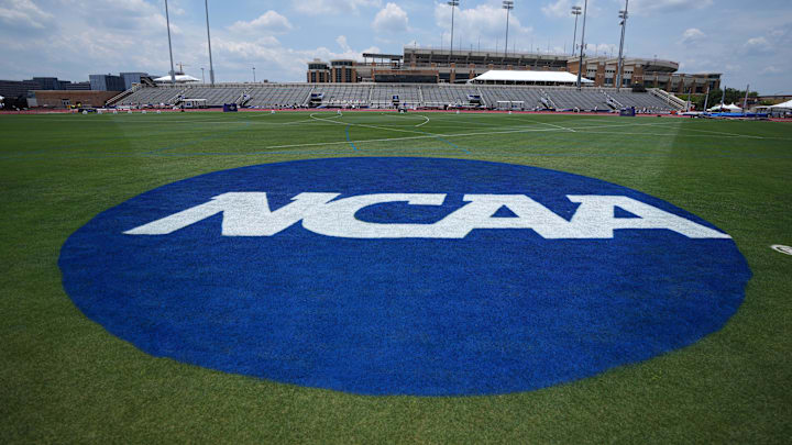 \The NCAA logo on the infield during the NCAA Track & Field Championships at Mike A. Myers Stadium. \The NCAA logo on the infield during the NCAA Track & Field Championships at Mike A. Myers Stadium.
