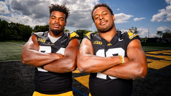 Defenders Jay Higgins, (34) and Nick Jackson (10) stand for a photo during Iowa football media day in Iowa City, Friday, Aug. 9, 2024.