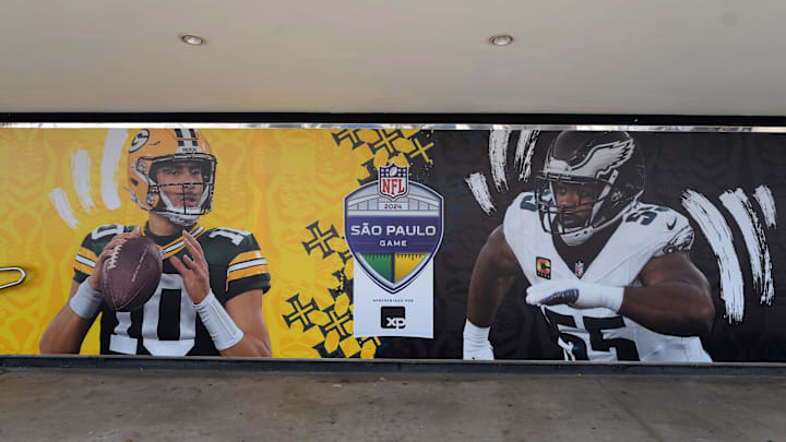 Sep 5, 2024; Sao Paolo, Brazil; Signage with mages of Green Bay Packers quarterback Jordan Love (10) and Philadelphia Eagles defensive end Brandon Graham (55) at the Neo Química Arena. Mandatory Credit: Kirby Lee-Imagn Images