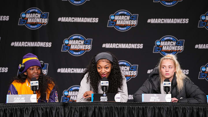 LSU Lady Tigers guard Flau'jae Johnson (4) forward Angel Reese (10) and guard Hailey Van Lith (11) take questions from the media at MVP Arena, Sunday, March 31, 2024 in Albany, N.Y.