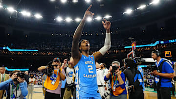 Apr 2, 2022; New Orleans, LA, USA; North Carolina Tar Heels guard Caleb Love (2) celebrates after defeating the Duke Blue Devils during the 2022 NCAA men's basketball tournament Final Four semifinals at Caesars Superdome. Mandatory Credit: Andrew Wevers-Imagn Images