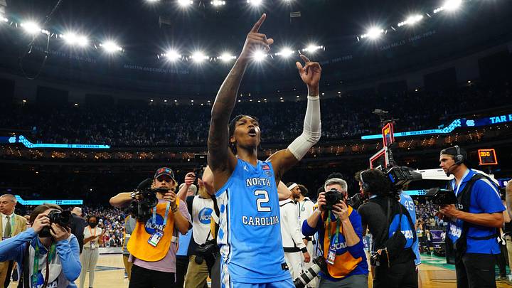 Apr 2, 2022; New Orleans, LA, USA; North Carolina Tar Heels guard Caleb Love (2) celebrates after defeating the Duke Blue Devils during the 2022 NCAA men's basketball tournament Final Four semifinals at Caesars Superdome. Mandatory Credit: Andrew Wevers-Imagn Images