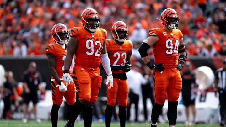 Cincinnati Bengals defensive tackle B.J. Hill (92) and Cincinnati Bengals defensive end Sam Hubbard (94) walk to the line of scrimmage in the fourth quarter of the NFL game against the New England Patriots at Paycor Stadium in Cincinnati on Sunday, Sept. 8, 2024.