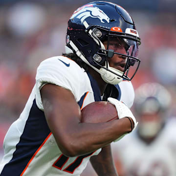 Aug 26, 2023; Denver, Colorado, USA; Denver Broncos wide receiver Lil'Jordan Humphrey (17) carries the ball in the first quarter against the Los Angeles Rams at Empower Field at Mile High. Mandatory Credit: Ron Chenoy-Imagn Images