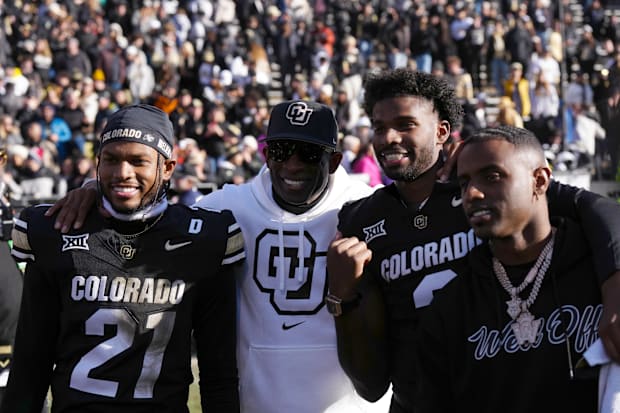 Colorado Buffaloes safety Shilo Sanders, head coach Deion Sanders, quarterback Shedeur Sanders, and Deion Sanders Jr.