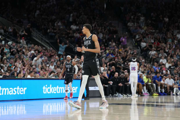 San Antonio Spurs center Victor Wembanyama (1) reacts in the second half against the Philadelphia 76ers at Frost Bank Center.