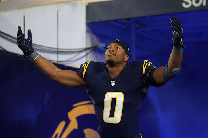 Los Angeles Chargers linebacker Daiyan Henley enters the field before the game against the Baltimore Ravens.