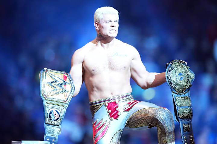 Cody Rhodes celebrates after winning the WWE Undisputed Championship match during the WWE Royal Rumble.