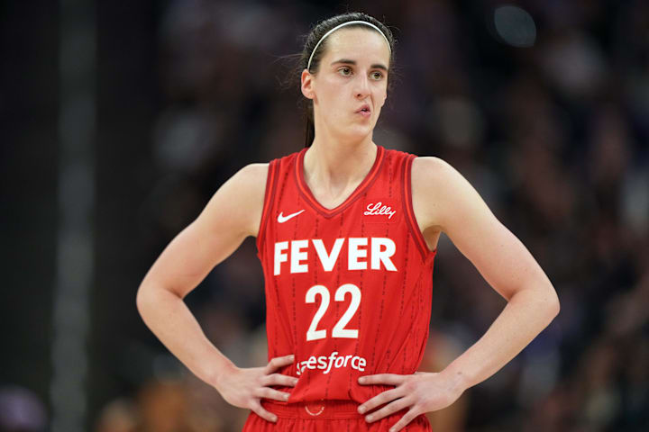 Indiana Fever guard Caitlin Clark reacts during the fourth quarter against the Golden State Valkyries.