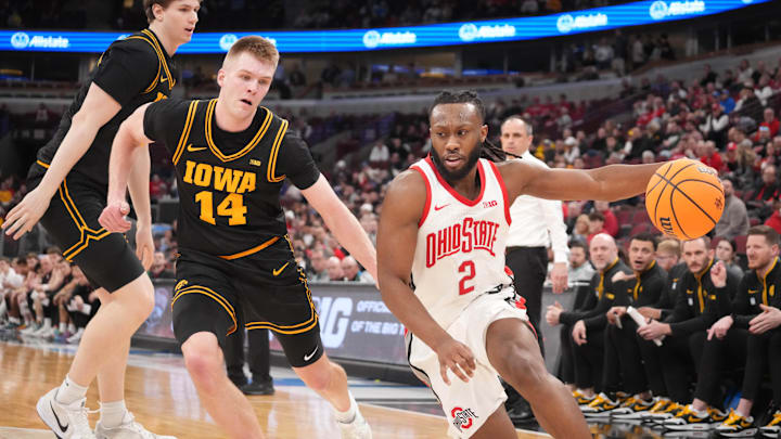 Mar 12, 2026; Chicago, IL, USA; Iowa Hawkeyes guard Bennett Stirtz (14) defends Ohio State Buckeyes guard Bruce Thornton (2) during the first half at United Center. Mandatory Credit: David Banks-Imagn Images