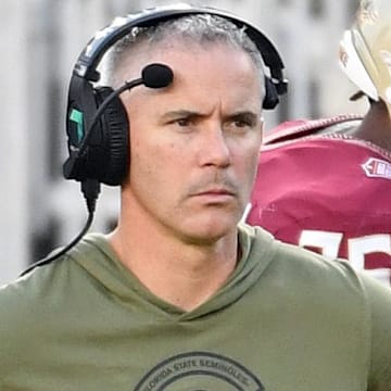 Nov 2, 2024; Tallahassee, Florida, USA; Florida State Seminoles head coach Mike Norvell looks on from the sideline after the North Carolina Tarheels score a final touchdown in the fourth quarter at Doak S. Campbell Stadium. Mandatory Credit: Robert Myers-Imagn Images