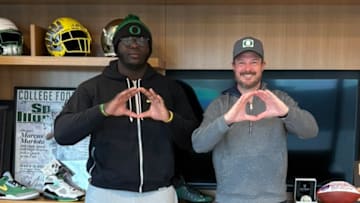 Five-star offensive tackle Immanuel Iheanacho with Oregon Ducks coach Dan Lanning