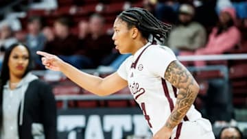Mississippi State Guard Trayanna Crisp (#4) during the game between the UNC-Charlotte 49ers and the Mississippi State Bulldogs at Humphrey Coliseum in Starkville, MS.
