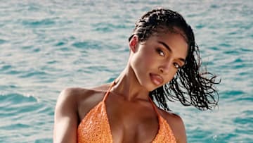 Lori Harvey was photographed by Yu Tsai in Mexico. Swimsuit by Norma Kamali.