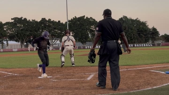 Misael Uriepero scores the lone run of the game in the first inning for True North Classical Academy, as it upset top-ranked Stoneman Douglas.