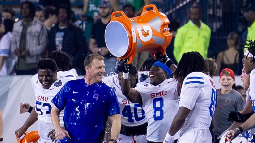 Dec 2, 2023; New Orleans, LA, USA; Southern Methodist Mustangs head coach Rhett Lashlee gets a