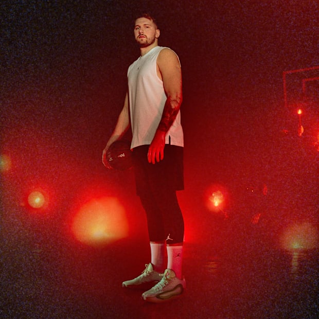 Luka Dončić wears green Jordan Brand sneakers.