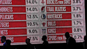 May 12, 2025; Chicago, Illinois, US; Representitives of the NBA teams walk onto the stage during the 2025 NBA Draft Lottery at McCormick Place. Mandatory Credit: David Banks-Imagn Images