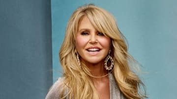 Christie Brinkley was photographed by Yu Tsai in Hollywood, Fla. Dress by Costarellos. Shoes by Stuart Weitzman. Jewelry by Ettika.