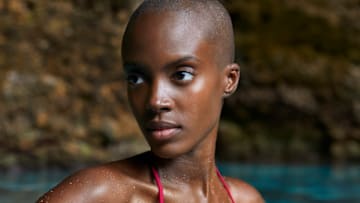 Madisin Rian was photographed by James Macari in the Dominican Republic. Swimsuit by HAUS OF PINKLEMONAID.