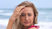 Nelly Korda was photographed by Ben Horton at The Boca Raton. Swimsuit by Agua Bendita.