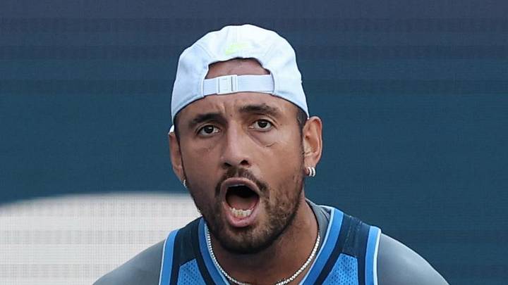 Nick Kyrgios reacts after winning a point