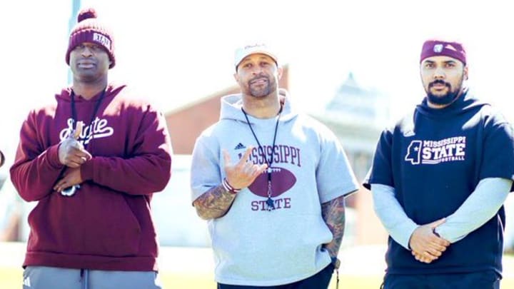 Mississippi State Strength and Conditioning coach Shaud Williams (middle)