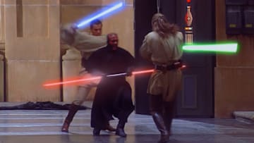 Star Wars: The Phantom Menace. Darth Maul duels lightsabers with Obi-Wan Kenobi and Qui-Gon Jinn. Image credit: Star Wars.com 