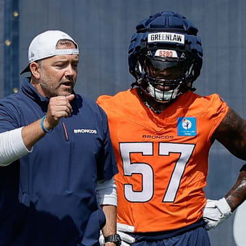 Jul 24, 2025; Englewood, CO, USA; Denver Broncos inside linebackers coach Jeff Schmedding with linebackers Levelle Bailey (56), Justin Strnad (40), Drew Sanders (41), Dre Greenlaw (57), and Alex Singleton (49) during Denver Broncos Training Camp