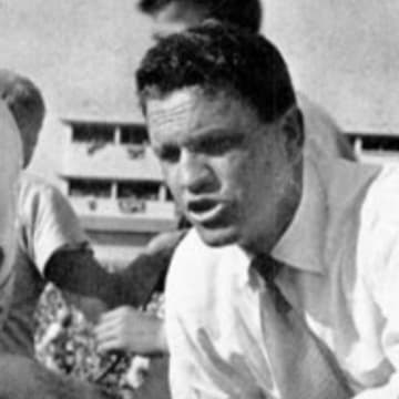 Bernie Crimmins gives instructions during a game at old Memorial Stadium during the 1952 season.