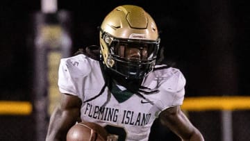 Sam Singleton (2) runs the ball downfield during the first half of the game at Citizens Field in Gainesville, FL on Thursday, October 27, 2022. [Jesse Gann/Gainesville Sun]

Flgai 102722 Hsfb Buchholzvsflemingisland 6146 Jessegann