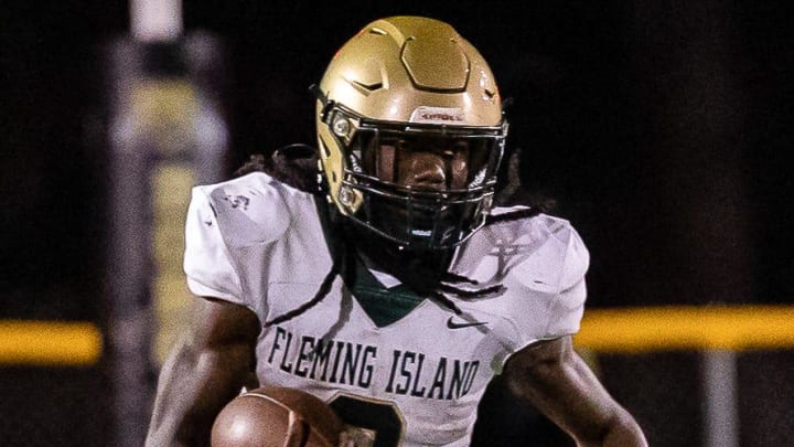 Sam Singleton (2) runs the ball downfield during the first half of the game at Citizens Field in Gainesville, FL on Thursday, October 27, 2022. [Jesse Gann/Gainesville Sun]

Flgai 102722 Hsfb Buchholzvsflemingisland 6146 Jessegann