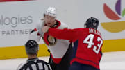 Brady Tkachuk and Tom Wilson drop gloves during the game between the Ottawa Senators and Washington Capitals