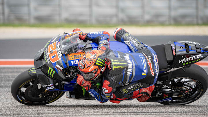 Apr 14, 2023; Austin, TX, USA; Fabio Quartararo (20) of France and Monster Energy Yamaha MotoGP Team rounds turn 11 during the MotoGP second free practice at Circuit of the Americas. Mandatory Credit: Dustin Safranek-Imagn Images