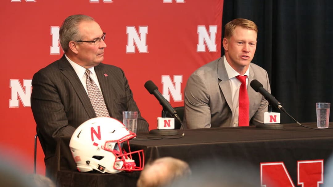 Bill Moos and  Scott Frost.