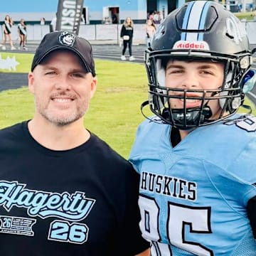 A chip off of the old block, Adam (left) officially has someone to look up to in 6-foot-3, Jacob (right) at Hagerty High School. 