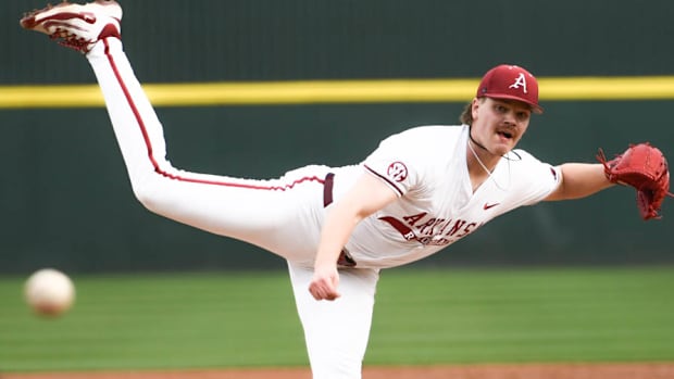 Razorbacks pitcher Ben Bybee delivers a pitch home against Oral Roberts