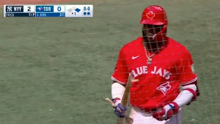 Vladimir Guerrero Jr. snaps his bat after a pop out in the first inning against the New York Yankees.
