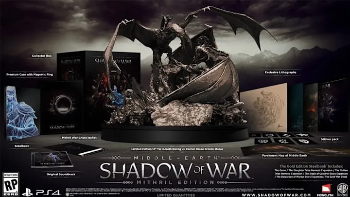 A big statue of a Balrog in front of a copy of Shadow of War
