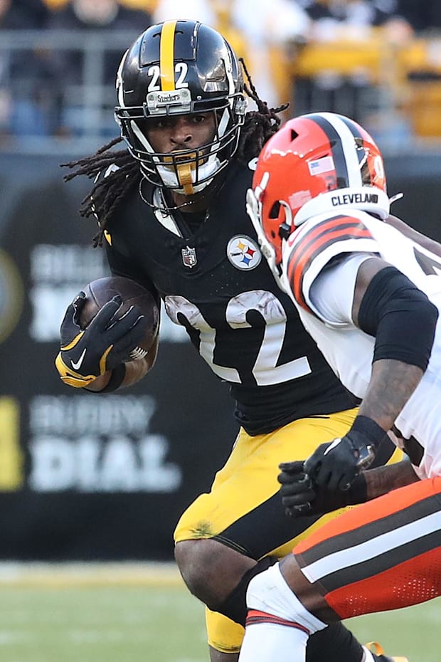 Pittsburgh Steelers running back Najee Harris carries the ball against Cleveland Browns cornerback Denzel Ward