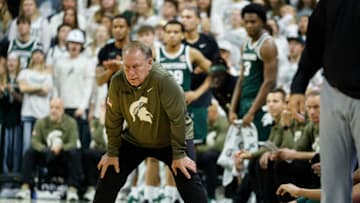Michigan State head coach Tom Izzo hunches over while watching his team take on San Jose State on Thursday, Nov. 13, 2025.