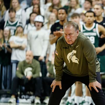 Michigan State head coach Tom Izzo hunches over while watching his team take on San Jose State on Thursday, Nov. 13, 2025.